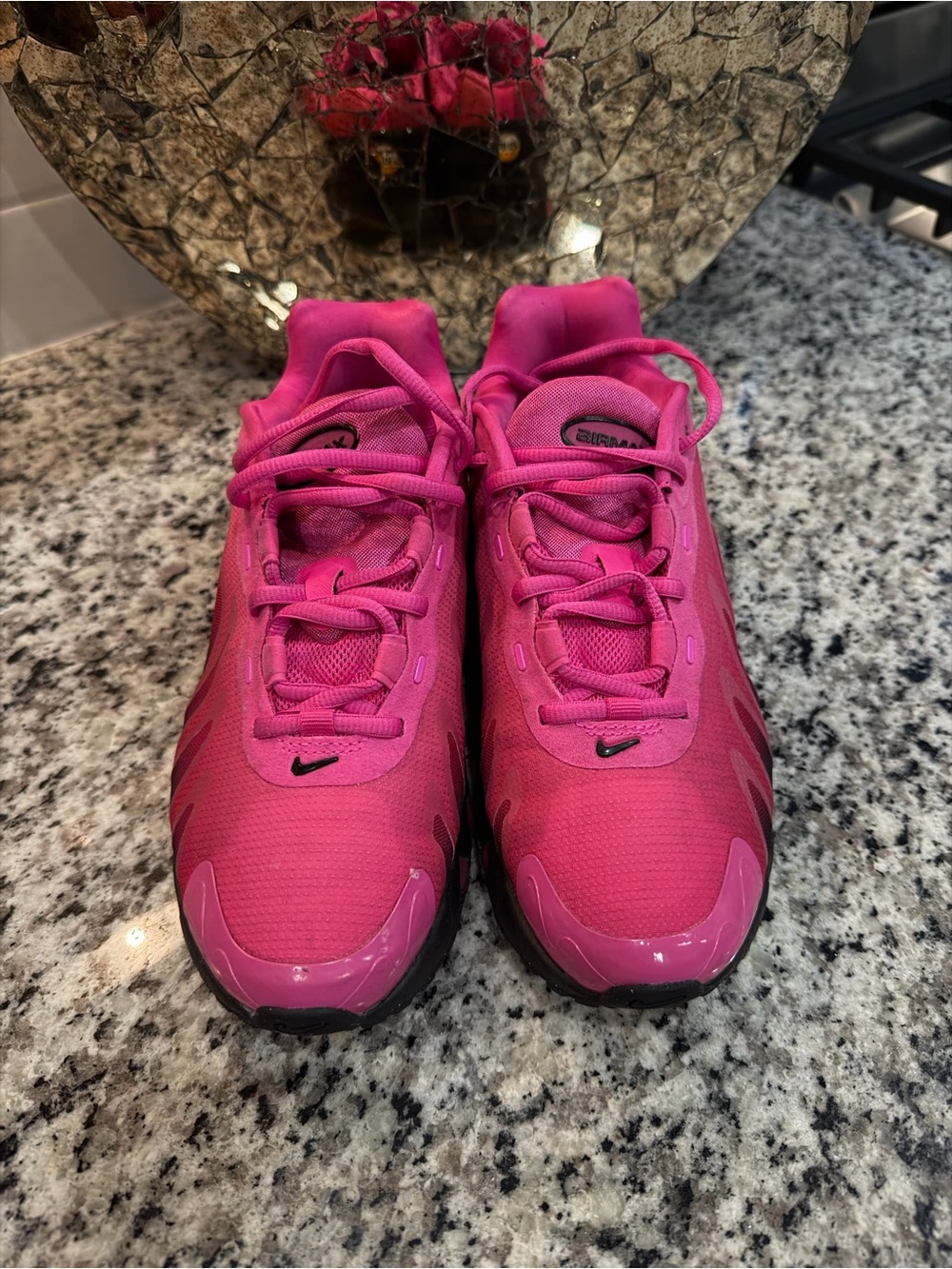 Nike Wmns Air Max DN8 sneakers in Laser Fuchsia and black.